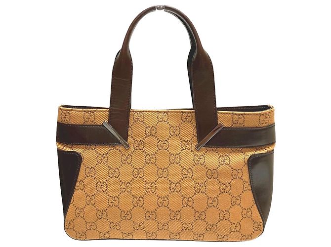 Bolsa Gucci em couro e canvas GG
