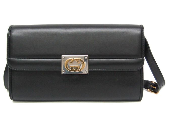 Clutch e borsa a tracolla in pelle Interlocking Gucci
