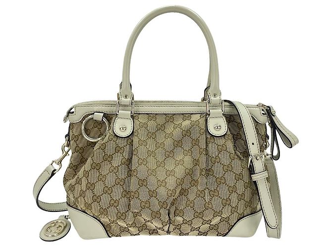 Borsa Gucci Sukey Top Handle GG Canvas e pelle Medium