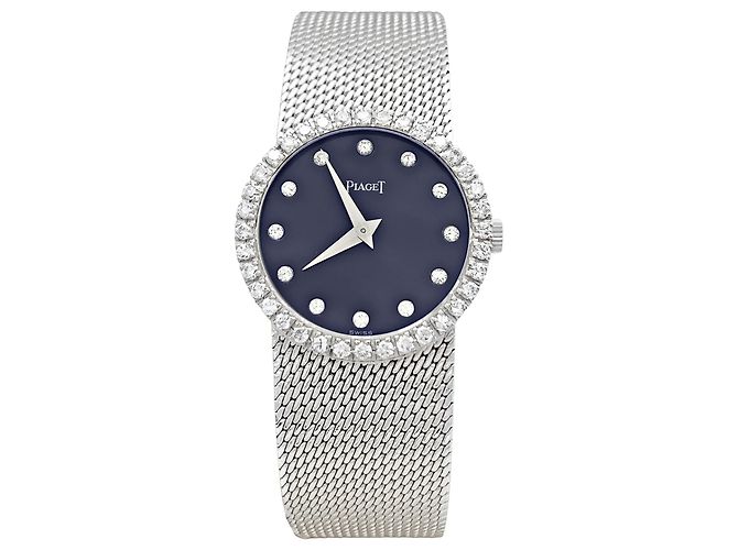 Reloj Piaget, oro blanco y diamantes.