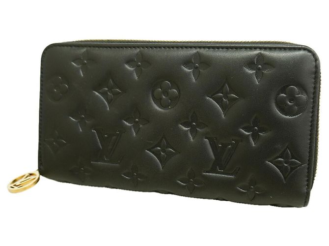 Cartera Louis Vuitton Monogram Coussin Zippy