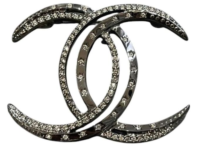 Broche Chanel Lua preta