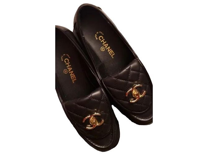 Chanel gesteppte schwarze Leder-Loafer