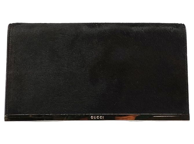 Gucci Clutch de pele preta com placa dourada
