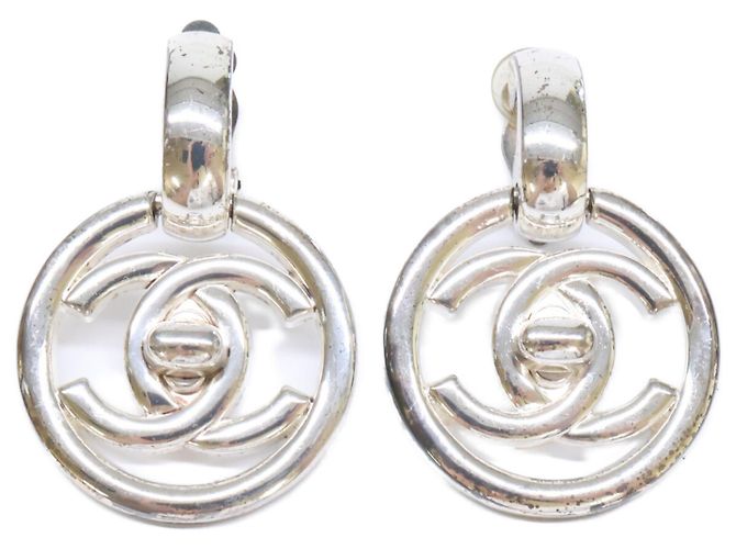 Orecchini a clip Chanel 97P Turnlock Coco Mark