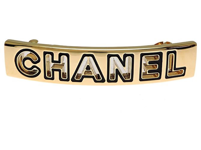 Fermi Chanel con logo placcato oro