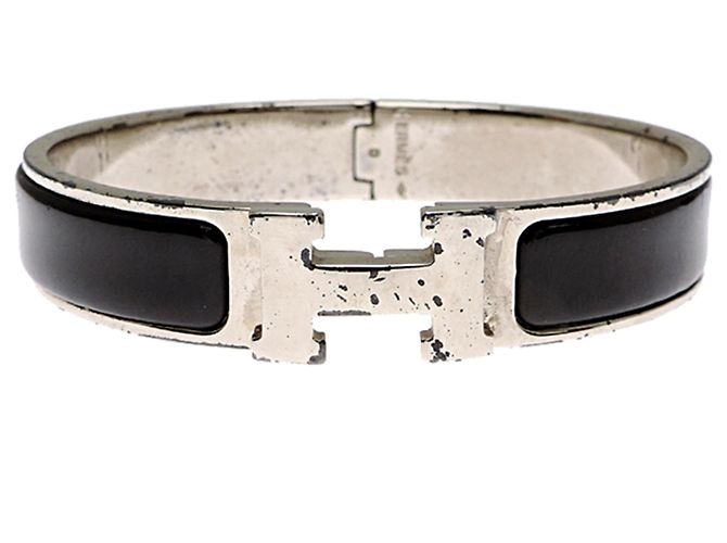Hermès Pulsera de amuletos chapada en oro Hermes