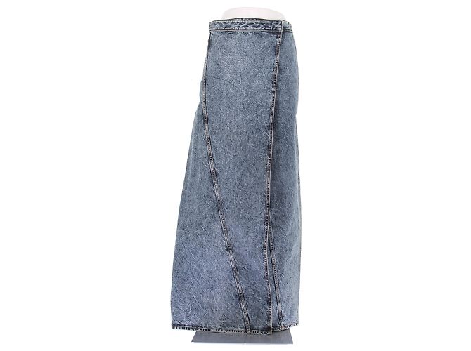 Alaïa Vaqueros de denim lavado con falda