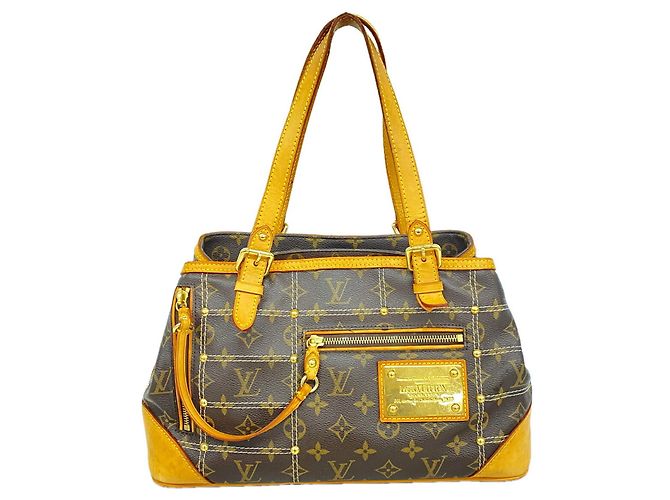 mala Louis Vuitton Monogram Rivet