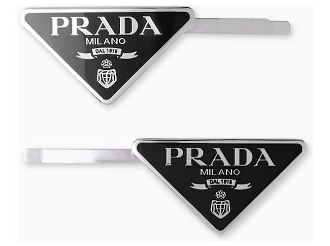 Prada Fermi per capelli in metallo neri