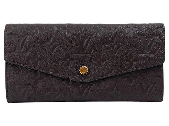 Louis Vuitton Cartera larga Curious Monogram Empreinte