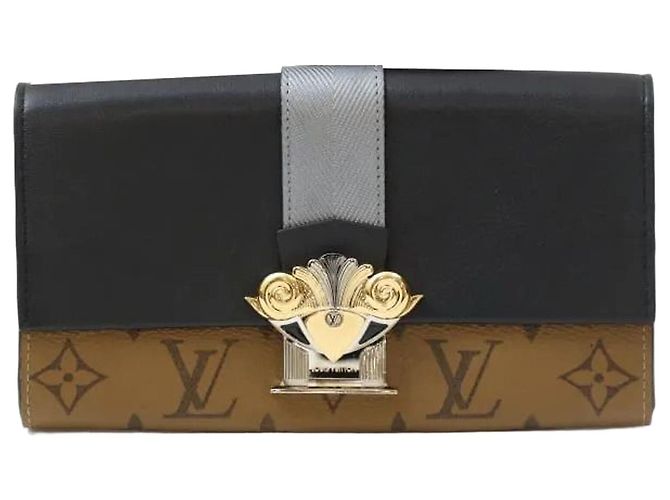 Louis Vuitton Cartera larga de lona Reverse Monogram
