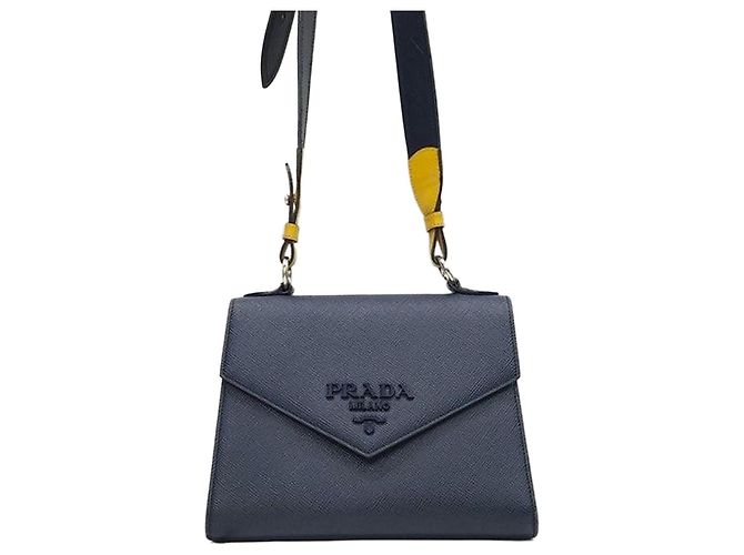Prada Bolsa de ombro com aba em couro Saffiano monocromática