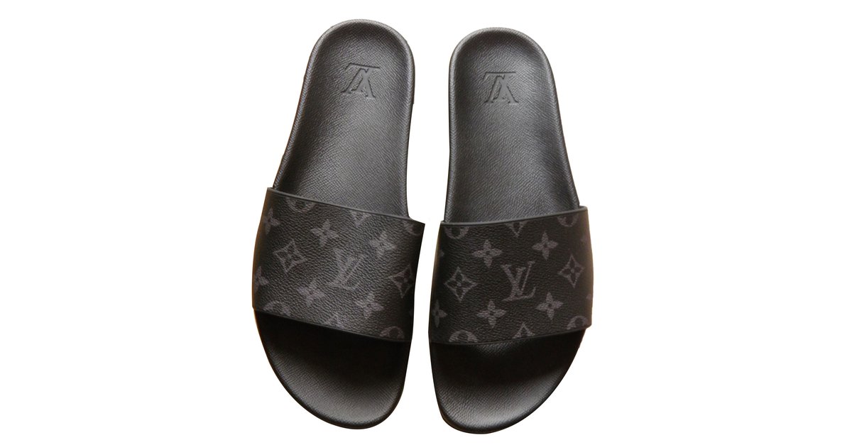 Sandals Louis Vuitton Black size 43.5 EU in Rubber - 30061932