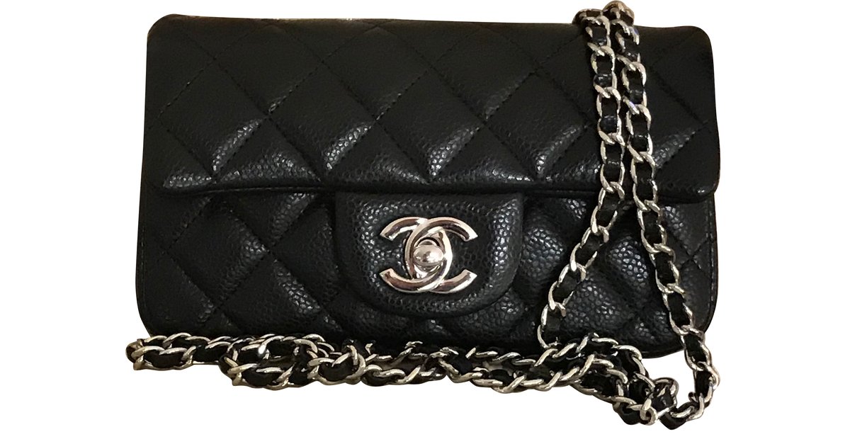 Timeless Chanel extra mini classic flap bag aus schwarzem