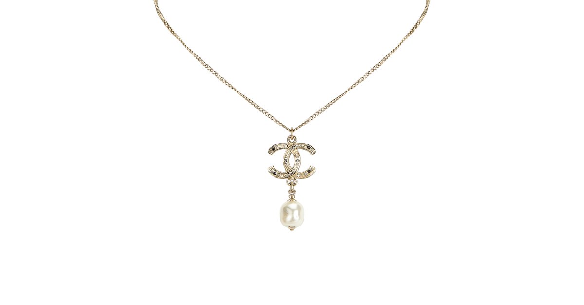 Chanel Classic Long Pearl Necklace with 5 CC Silver Crystal Logos
