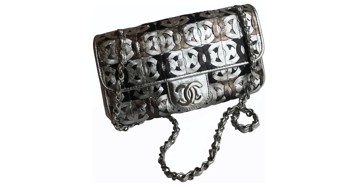 Timeless Chanel Limited Laser Cut Logo Classic Flap Bag Silvery