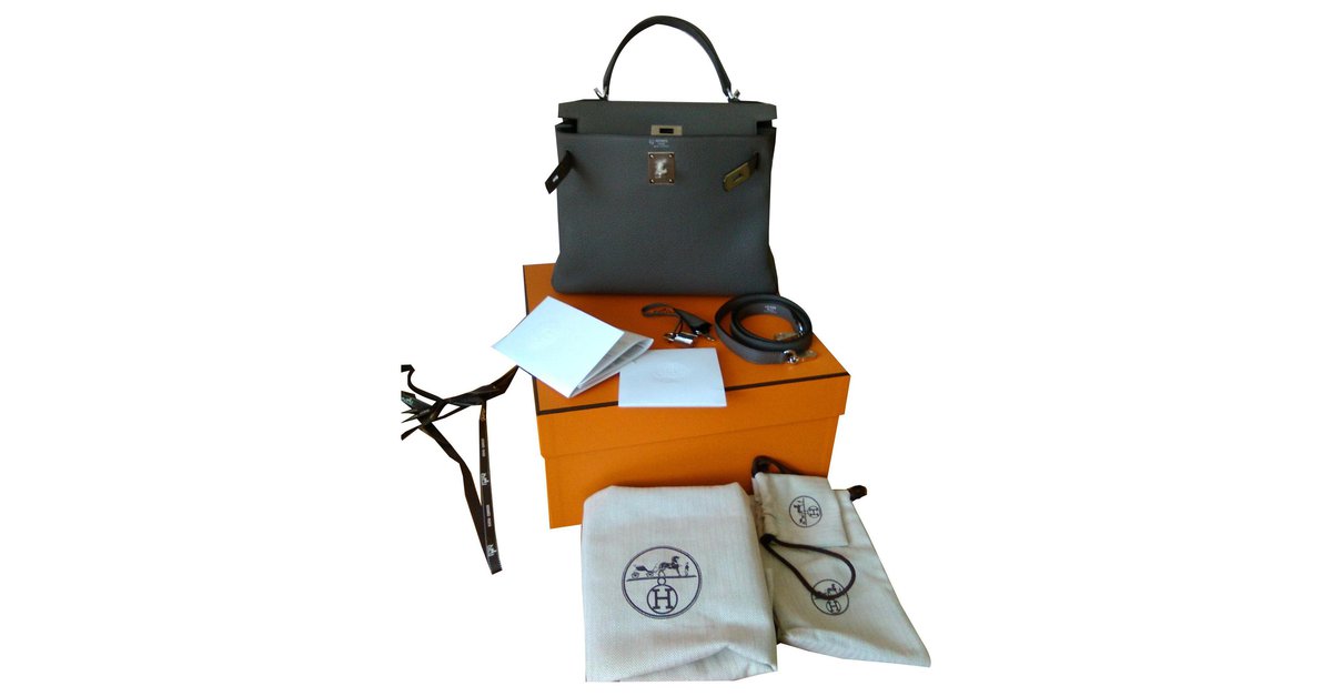 Hermès Gris Tourterelle Retourne Kelly 28cm of Togo Leather with