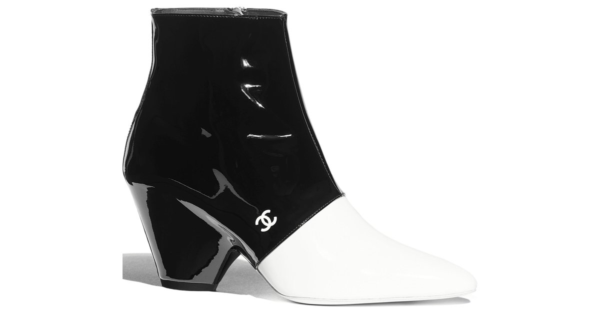 Chanel Sneakers Black White Leather ref.825222 - Joli Closet