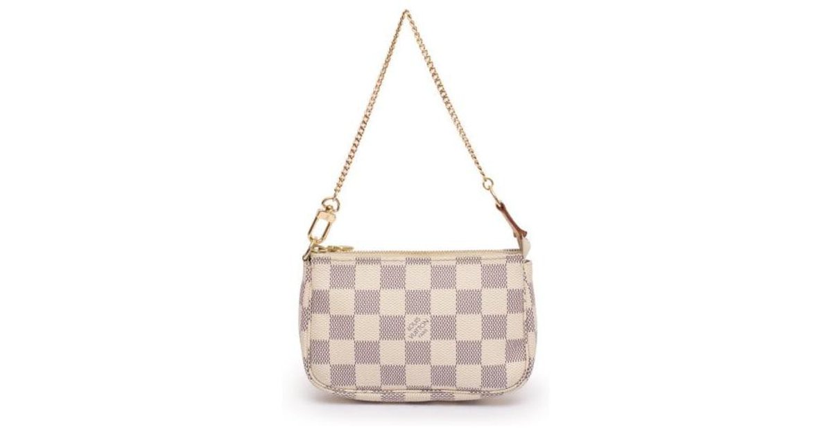 Pochette accessoire cloth handbag Louis Vuitton Beige in Cloth