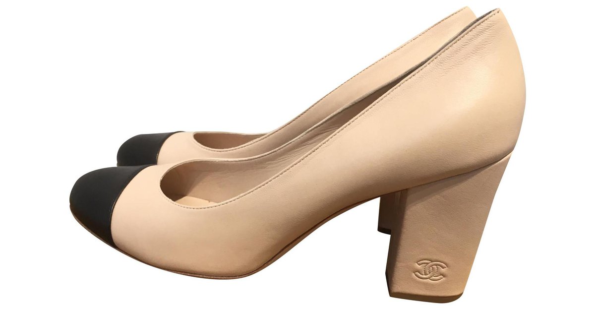 Chanel CC Gold-Tipped Heel Cap Toe Pumps