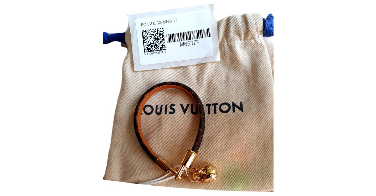 LOUIS VUITTON - Armband aus braunem und weißem Leder, Ar…