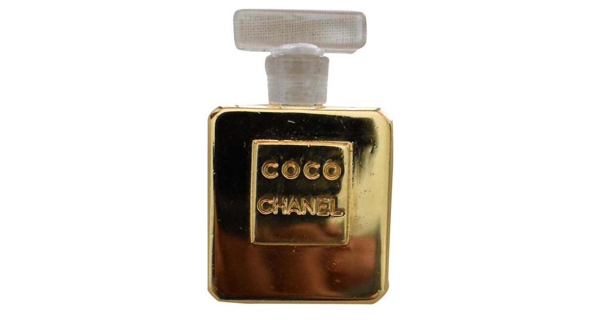 ONE Chanel perfume bottle Coco gold & acrylic clip-on earring Golden Metal  ref.191768