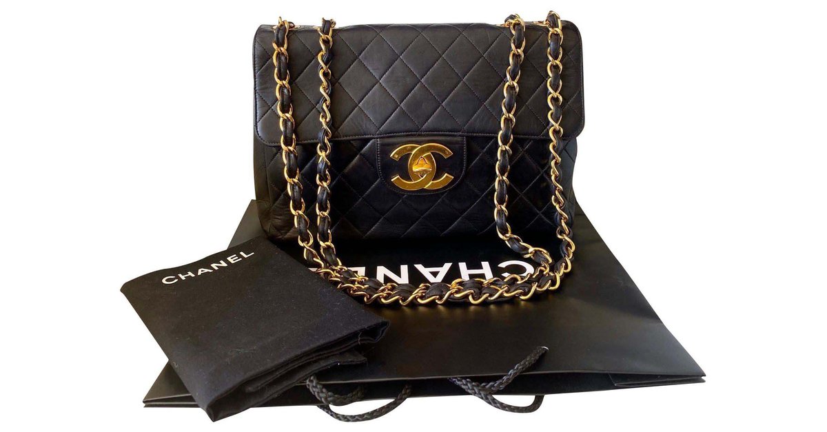 100% Authentic Chanel Vintage Black Lambskin Jumbo Classic Flap