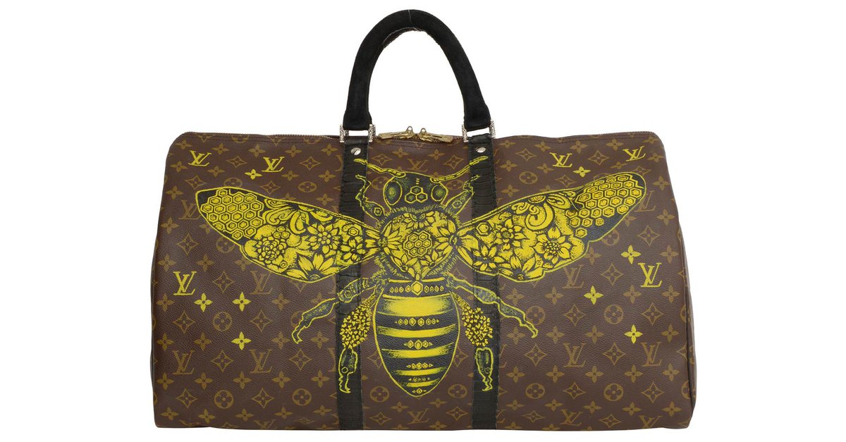 Mickey Fck of Philip Karto - Louis Vuitton bag with python and