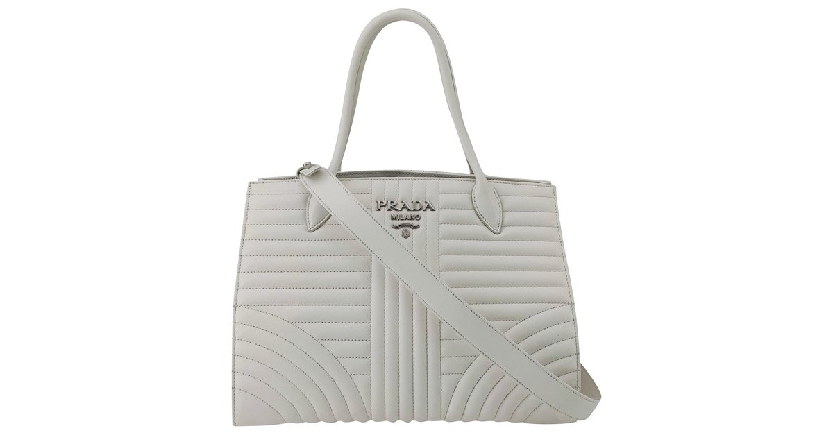 Prada, Diagramme shoulder bag in white leather  - Joli Closet