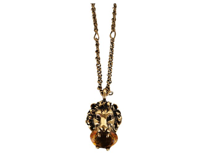 Gucci Lionhead necklace with Swarovski crystal Yellow Metal ref