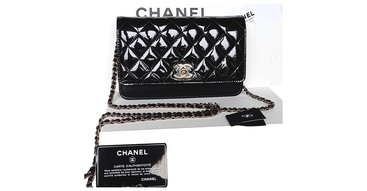 CHANEL Lambskin Pearl Wallet On Chain WOC lined Zip Chain Bag Black Leather  ref.976717 - Joli Closet