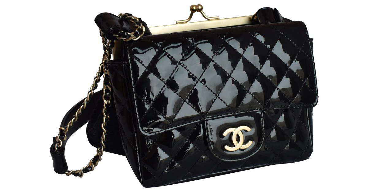 CHANEL DOUBLE KISSLOCK FOLD OVER QUILTED LEATHER MEDIUM CLUTCH