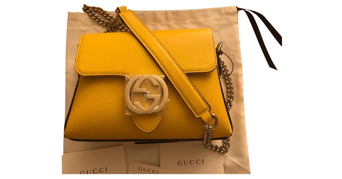 Interlocking leather crossbody bag Gucci Yellow in Leather - 32450062