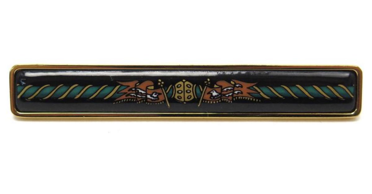 Hermès HERMES TIE CLIP IN GOLD PLATE AND BLACK ENAMEL GOLD PLATED