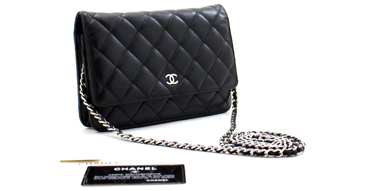 CHANEL Black Classic Wallet On Chain WOC Shoulder Bag Crossbody Leather  ref.322891 - Joli Closet
