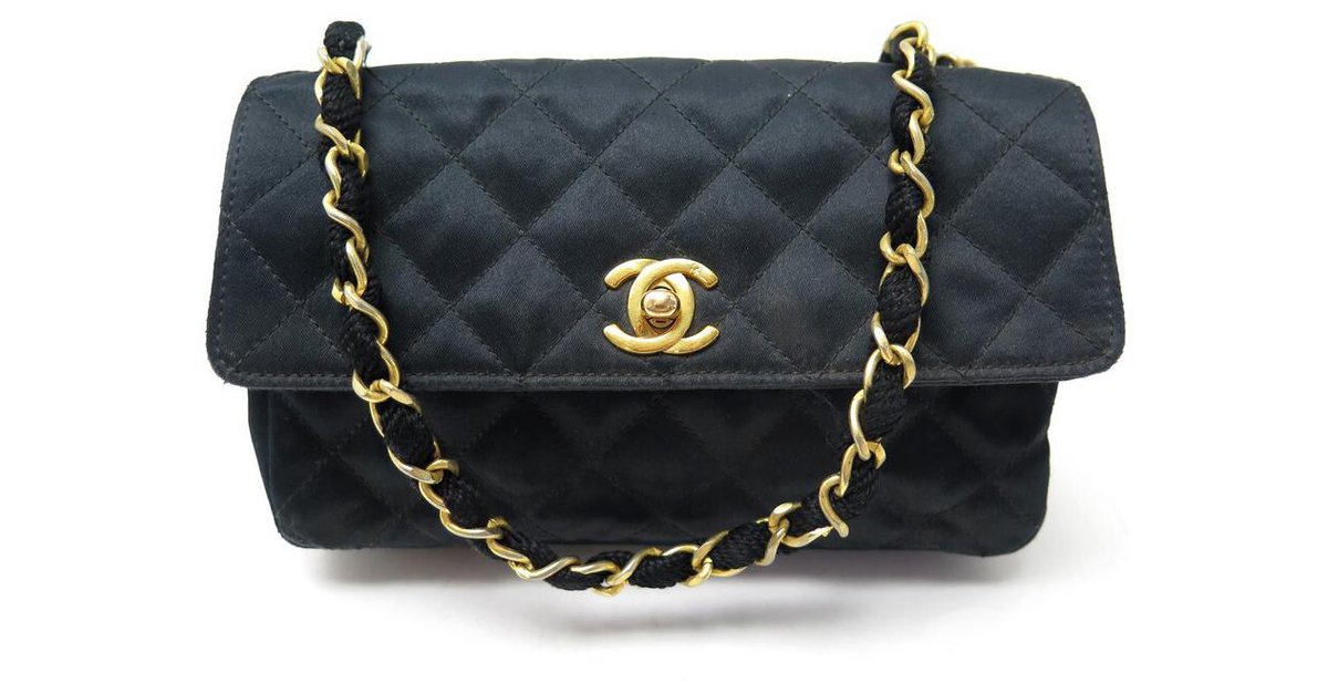 VINTAGE CHANEL MINI TIMELESS HANDBAG IN SATIN QUILTED BANDOULIERE HAND BAG  Black Cloth ref.328904