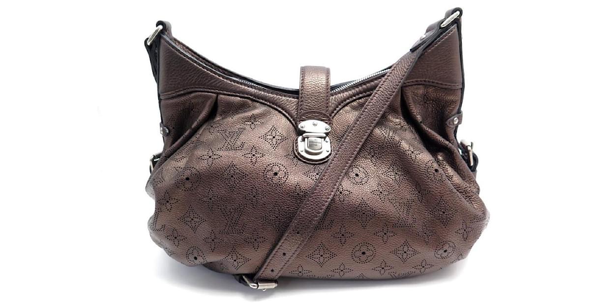 NEW LOUIS VUITTON XS HANDBAG MAHINA MONOGRAM PERFORATED BRONZE BAG Leather  ref.365075 - Joli Closet