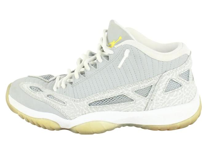 yellow and silver jordan 11