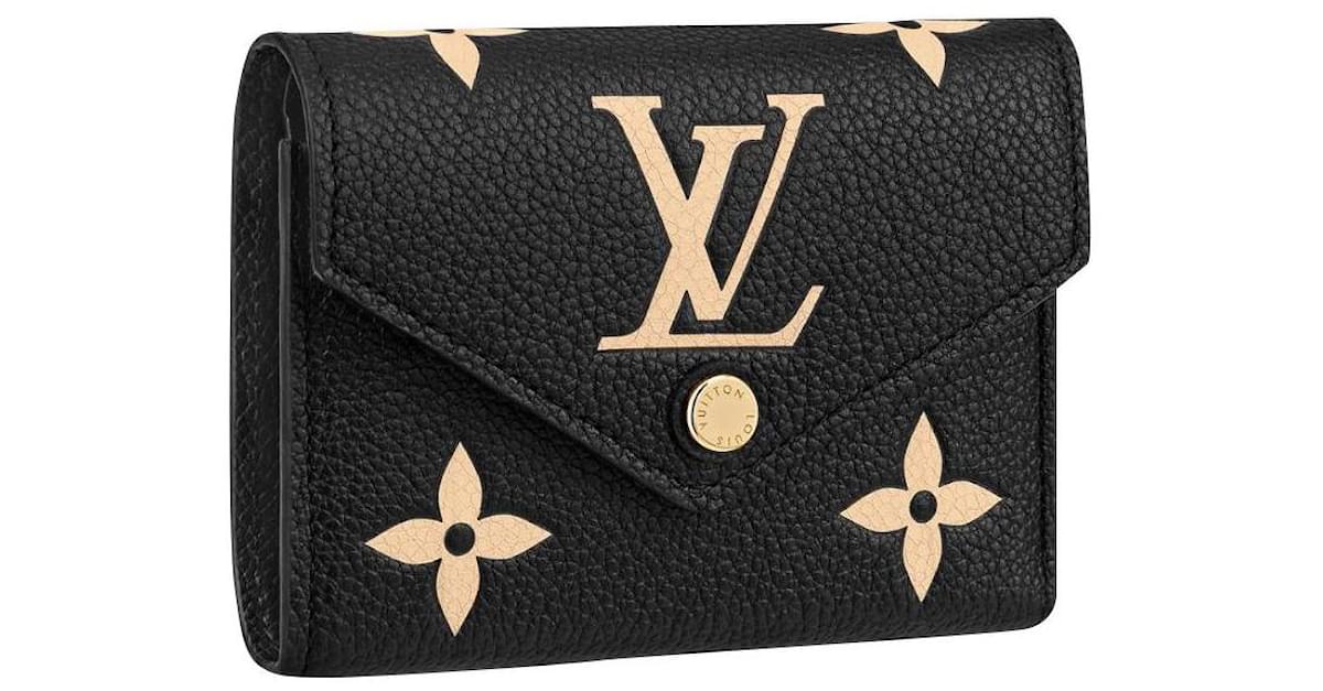 Louis Vuitton LV Victorine wallet empreinte leather Beige ref