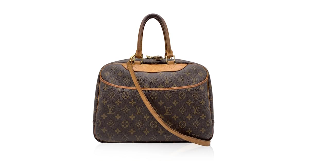 SAC DEAUVILLE pour le voyage en toile Monogram et cuir…