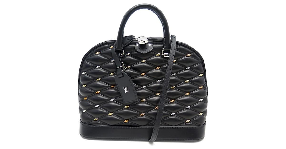 Louis Vuitton Malletage Handbag in Black and White Quilted Leather