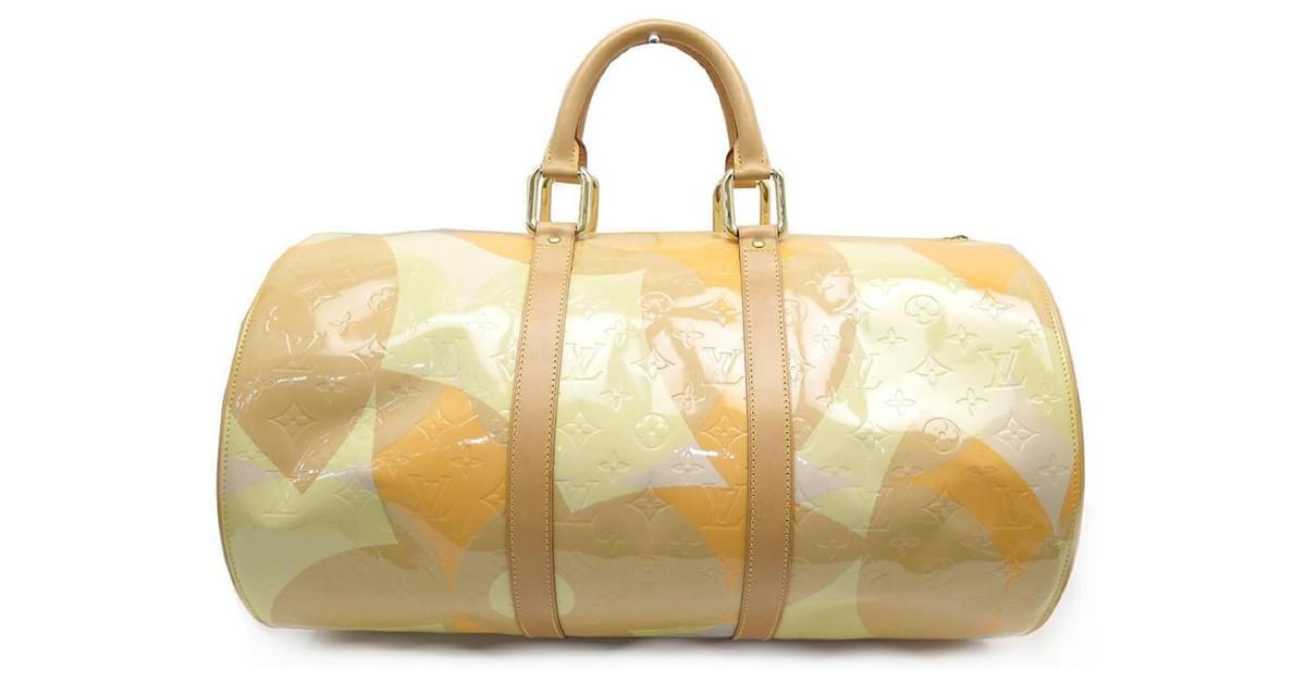 Keepall patent leather travel bag Louis Vuitton Yellow in Patent leather -  31764280