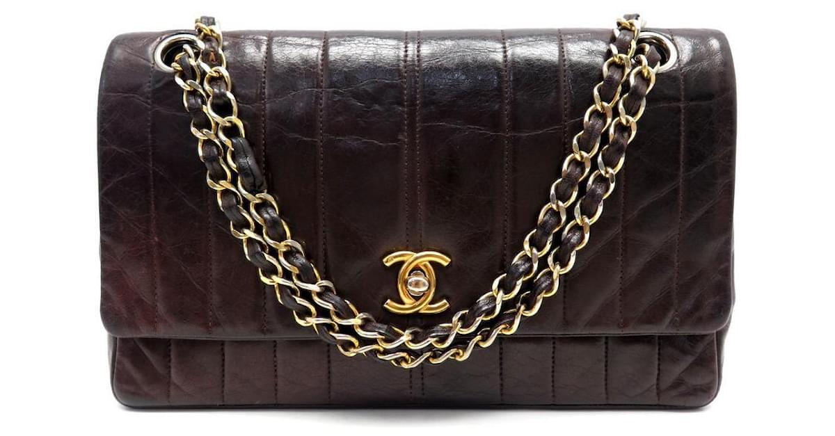 VINTAGE CHANEL HANDBAG CC CLASP IN QUILTED LEATHER PURSE PURSE Brown  ref.535007 - Joli Closet