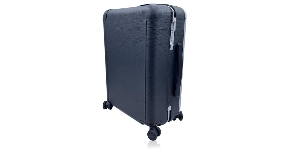 A black Epi Leather Pégase 55 Suitcase. - Bukowskis