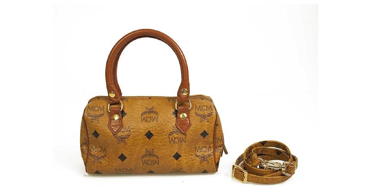 Buy MCM Brown Mini Boston Bag in Visetos Original for WOMEN in Kuwait