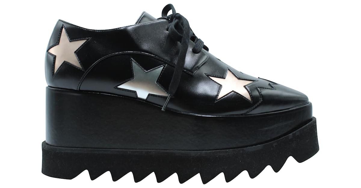 Stella Mc Cartney Stella McCartney Elyse Platform Wedge with Silver Star  Patches in Black Nappa Leather ref.570798 - Joli Closet