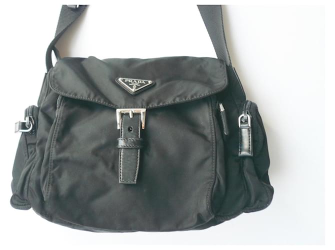PRADA Black messenger bag with two pockets on the very good