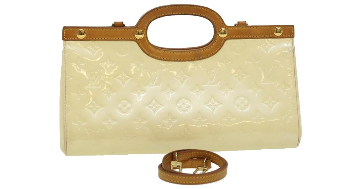 Louis Vuitton Roxbury Yellow Patent leather ref.666553 - Joli Closet