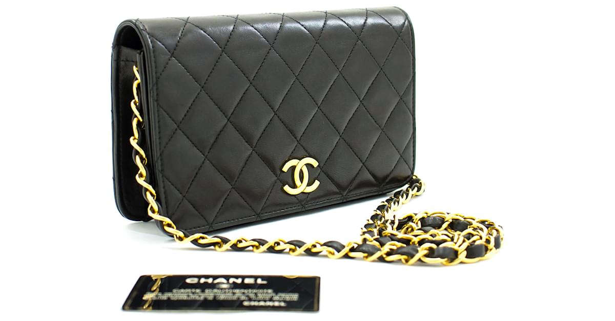 CHANEL Chain Shoulder Bag Clutch Black Quilted Flap Lambskin Purse Leather  ref.226136 - Joli Closet